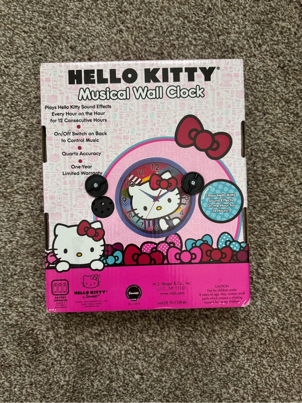 NIB Hello Kitty Blue Frame Pink Face Musical Wall Clock